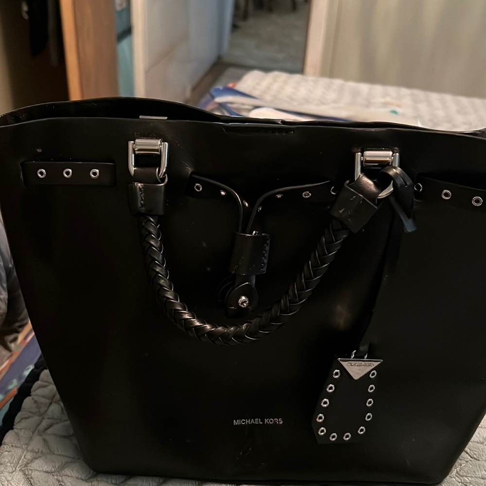 Almost like new very good condition black and silver Michael Kors bag